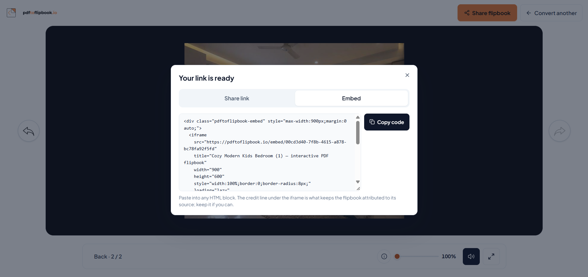 The share card over a flipbook, with the Embed tab selected, the HTML snippet visible, and a Copy code button